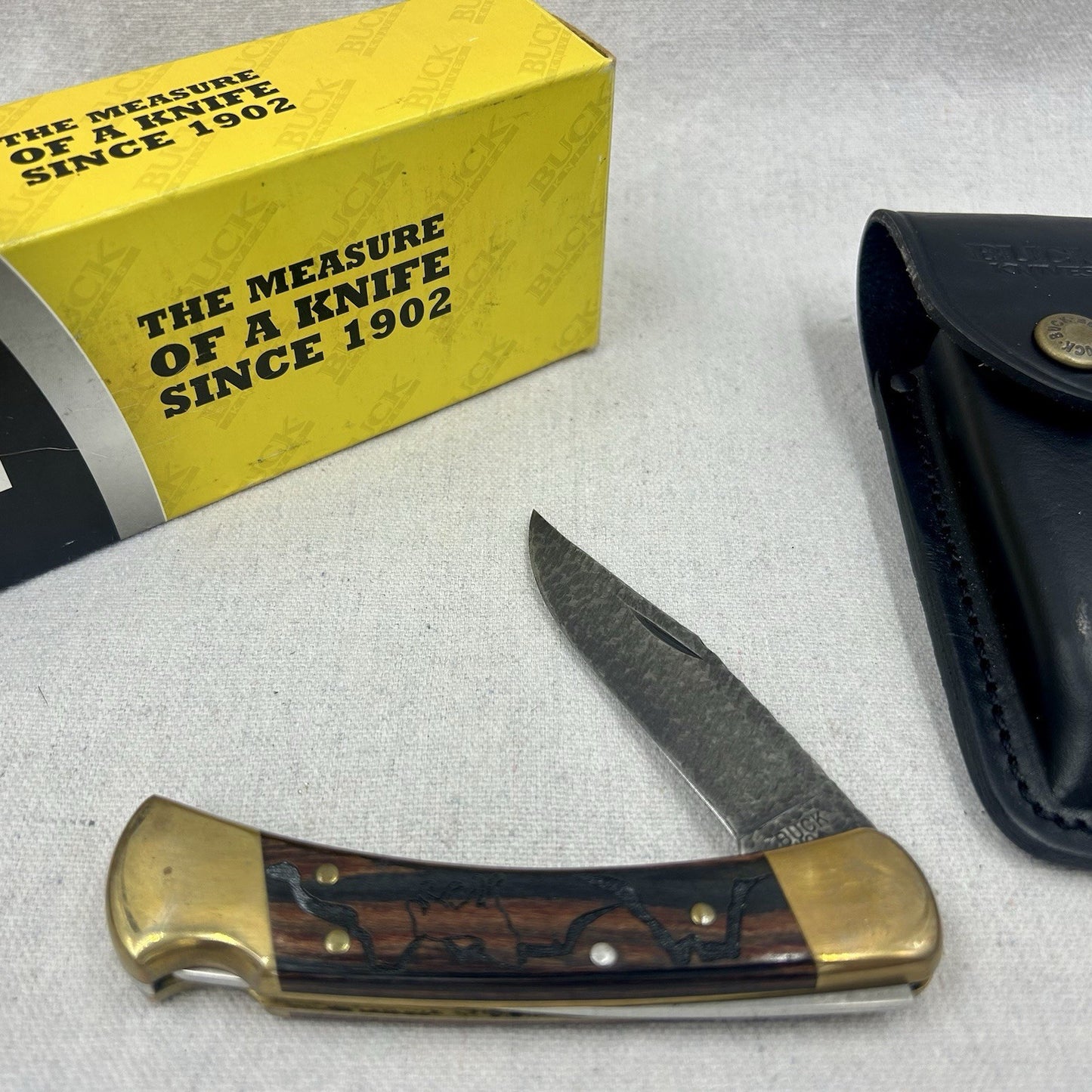 2008 Buck 110 USA David Yellowhorse “Wolf Valley” Native Steel Knife W/ Pouch
