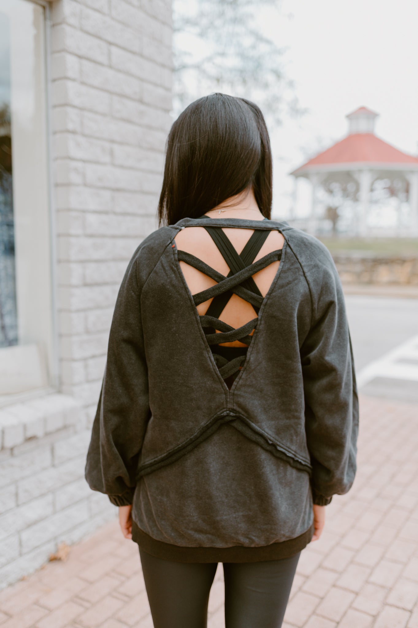 Its Showing Off Back Cross Sweatshirt- Black