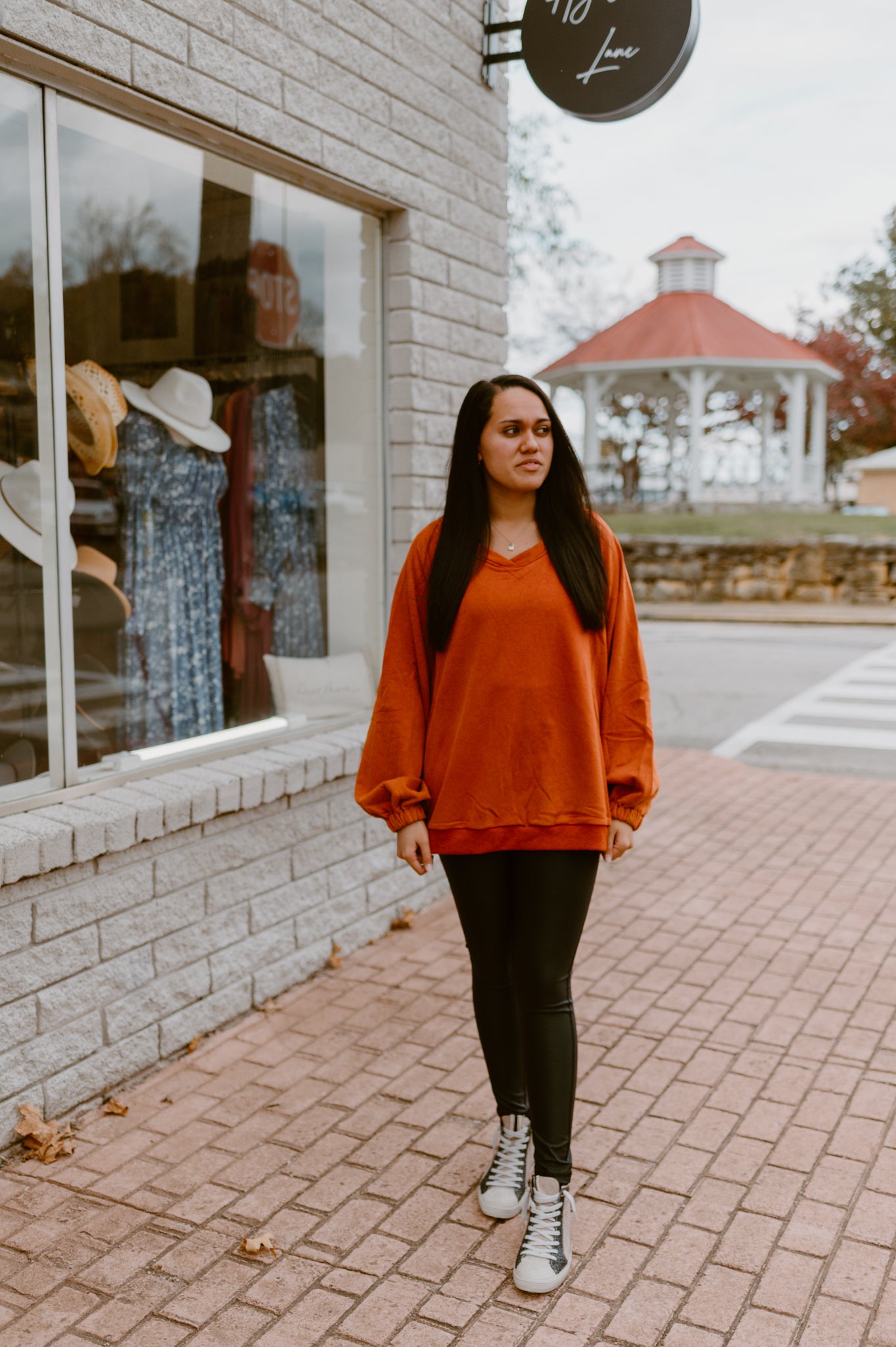 Its Showing Off Back Cross Sweatshirt- Rust Charcoal