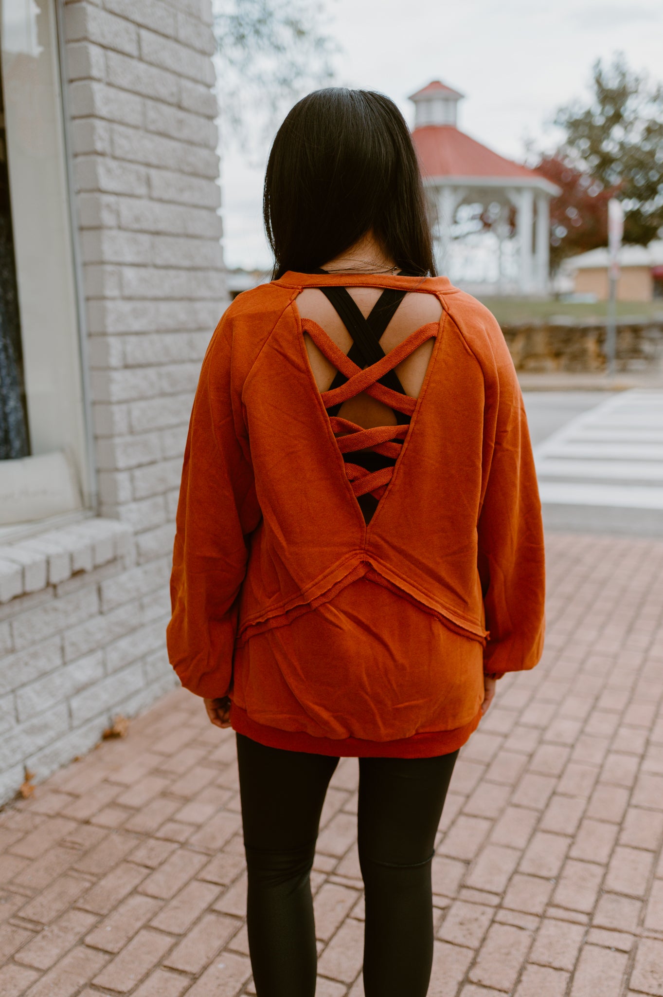 Its Showing Off Back Cross Sweatshirt- Rust Charcoal