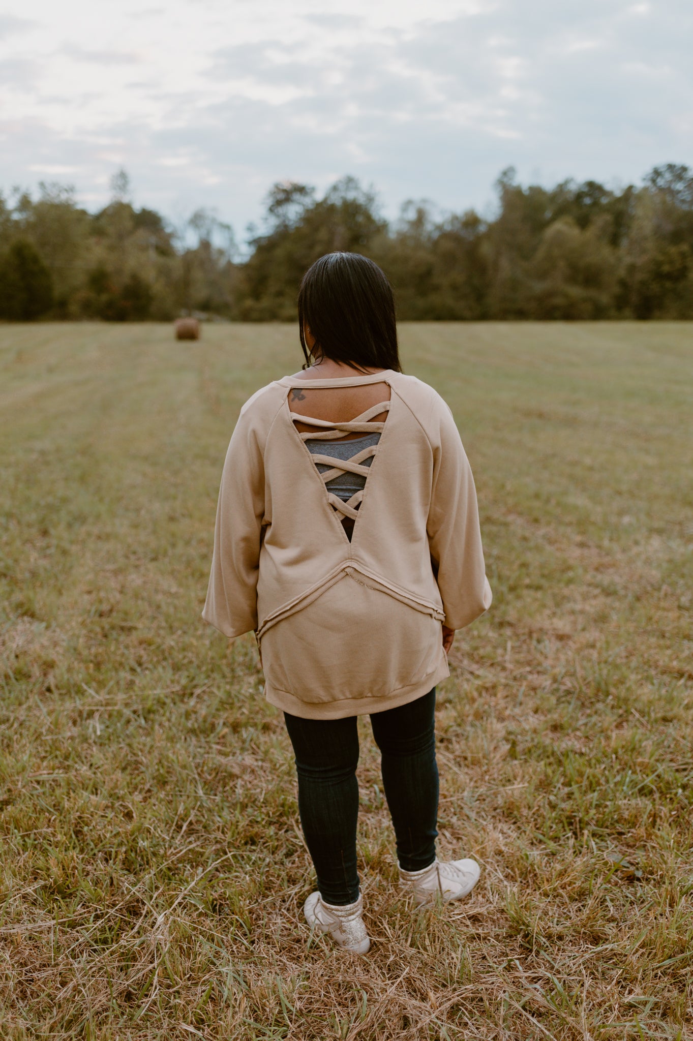 It's Showing Off Back Cross Sweatshirt